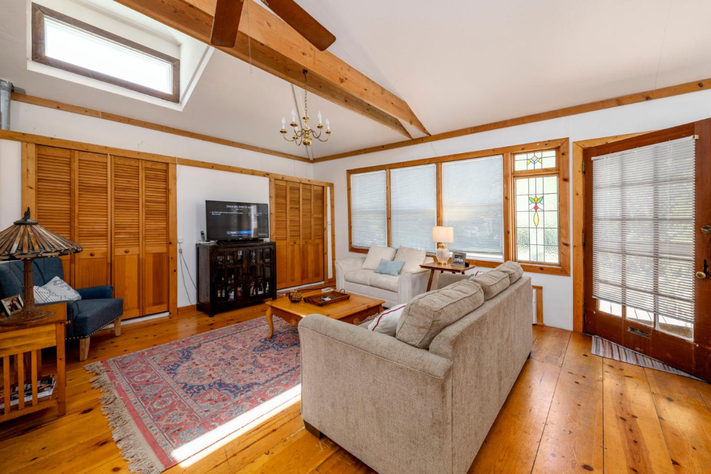 3190 Woodside Road Woodside, CA 94062 - Photo 26 of 34 a living room with furniture rug and wooden floor