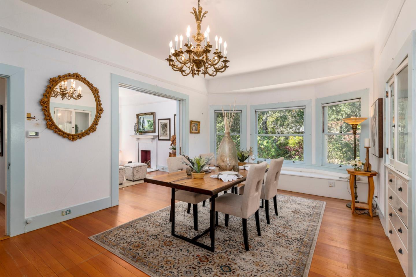 3190 Woodside Road Woodside, CA 94062 - Photo 10 of 34 a view of a dining room with furniture window and wooden floor
