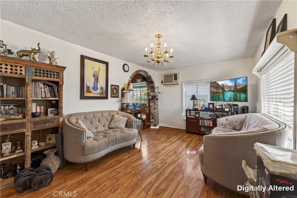 2437 Bloomdale Street Duarte, CA 91010 - Photo 11 of 23 a living room with furniture and a wooden floor