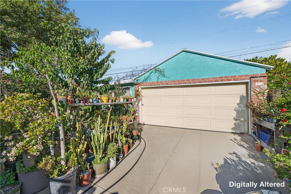 2437 Bloomdale Street Duarte, CA 91010 - Photo 15 of 23 a front view of a house with a garden