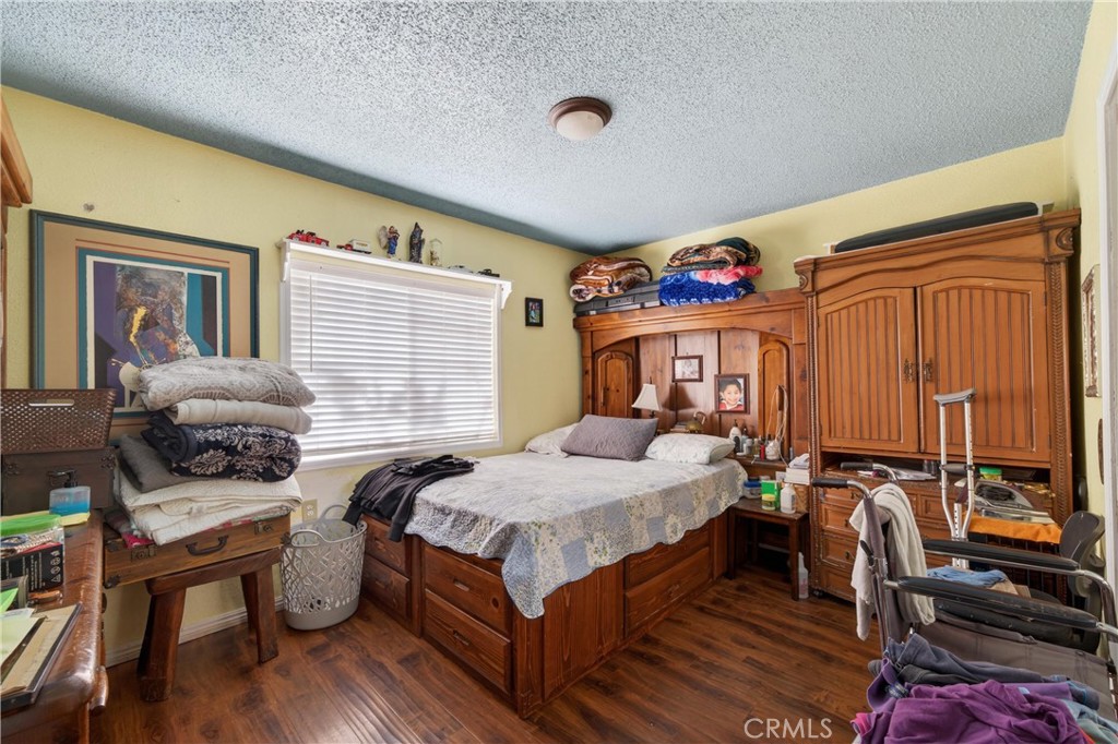 2437 Bloomdale Street Duarte, CA 91010 - Photo 17 of 23 a bedroom with bed a mirror and a window