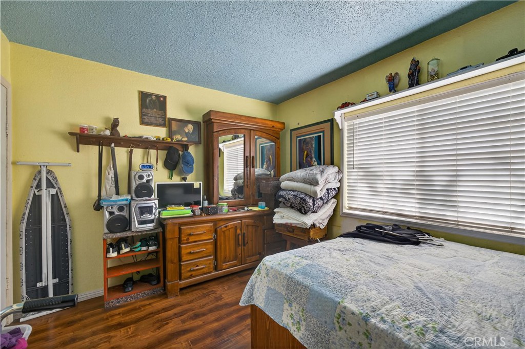 2437 Bloomdale Street Duarte, CA 91010 - Photo 18 of 23 a bedroom with furniture and a window