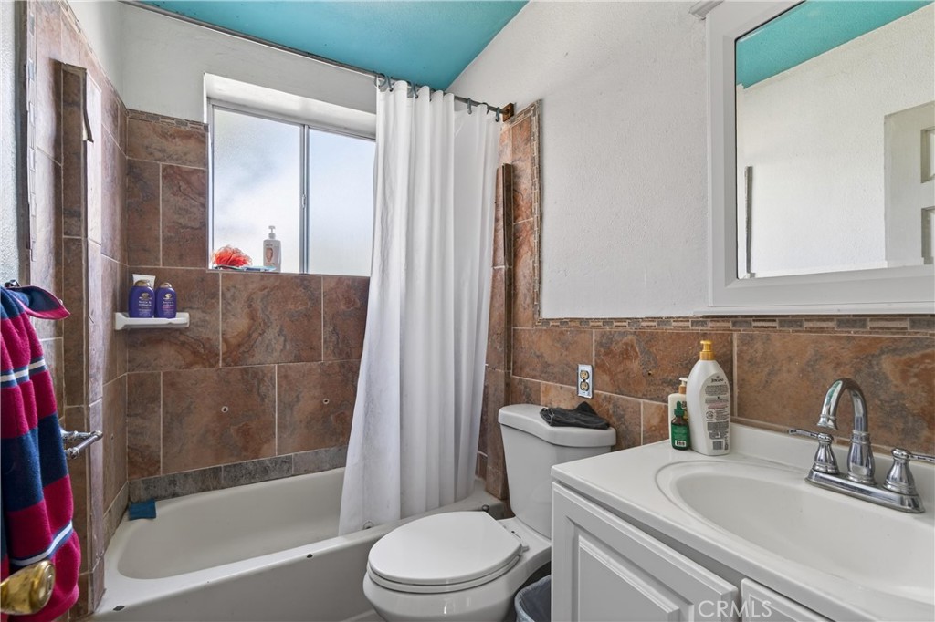 2437 Bloomdale Street Duarte, CA 91010 - Photo 21 of 23 a bathroom with a sink toilet and shower