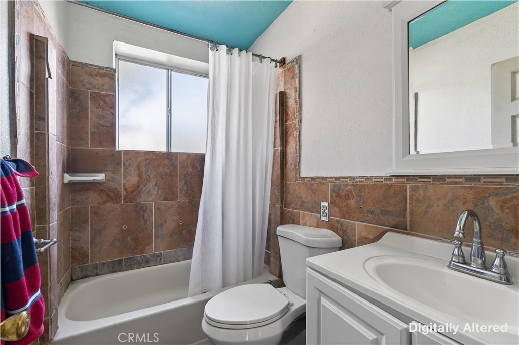 2437 Bloomdale Street Duarte, CA 91010 - Photo 22 of 23 a bathroom with a sink toilet and shower