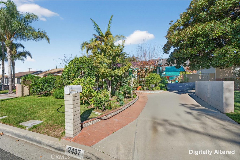 2437 Bloomdale Street Duarte, CA 91010 - Photo 3 of 23 a view of a garden with a bench
