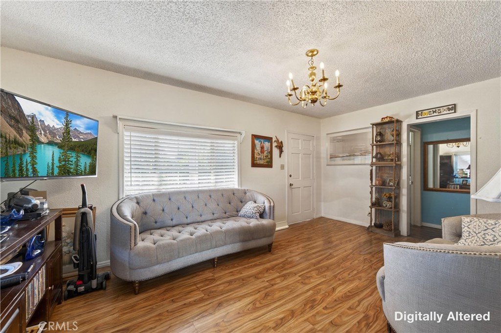 2437 Bloomdale Street Duarte, CA 91010 - Photo 5 of 23 a living room with furniture and a flat screen tv