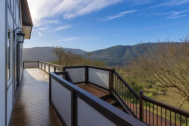 a view of a balcony with an outdoor space