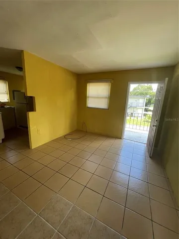 a view of a livingroom with wooden floor