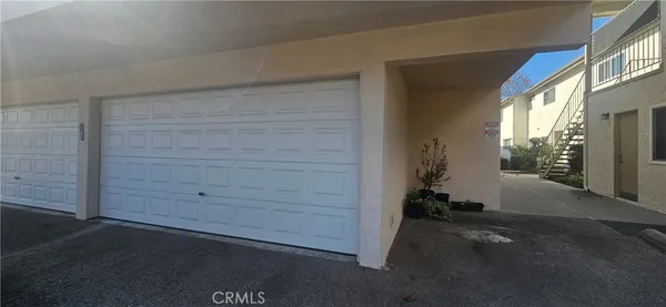a utility room with sink dryer and washer