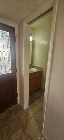 a view of hallway with stairs