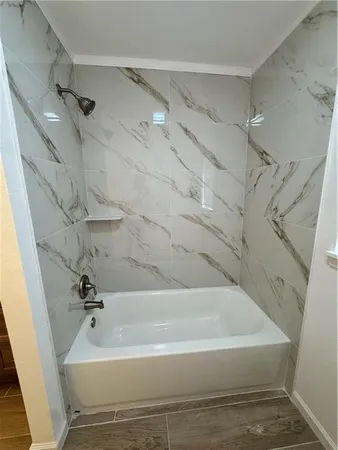 a bathroom with a bathtub