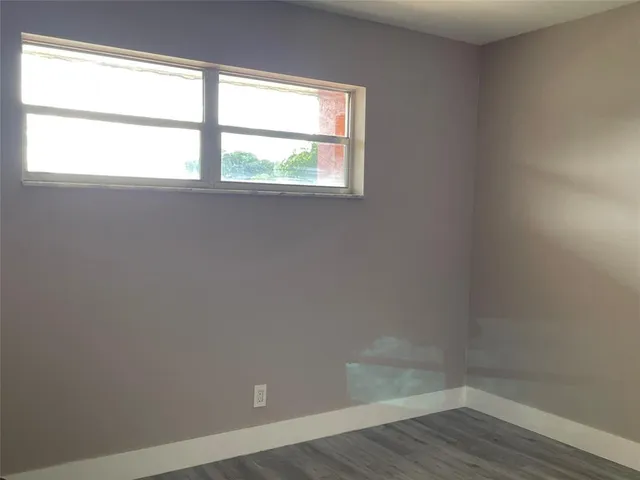 a view of swimming pool from a yard