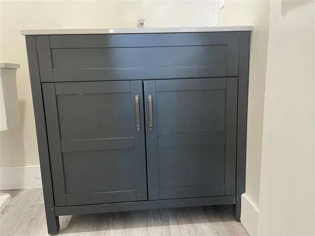 a view of a book shelf with lots of books
