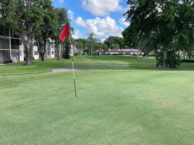 a kitchen with stainless steel appliances granite countertop a stove and a refrigerator
