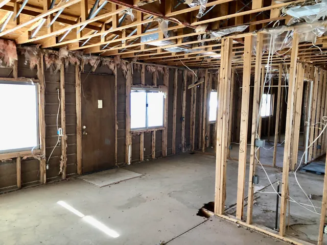 a view of a room with wooden walls