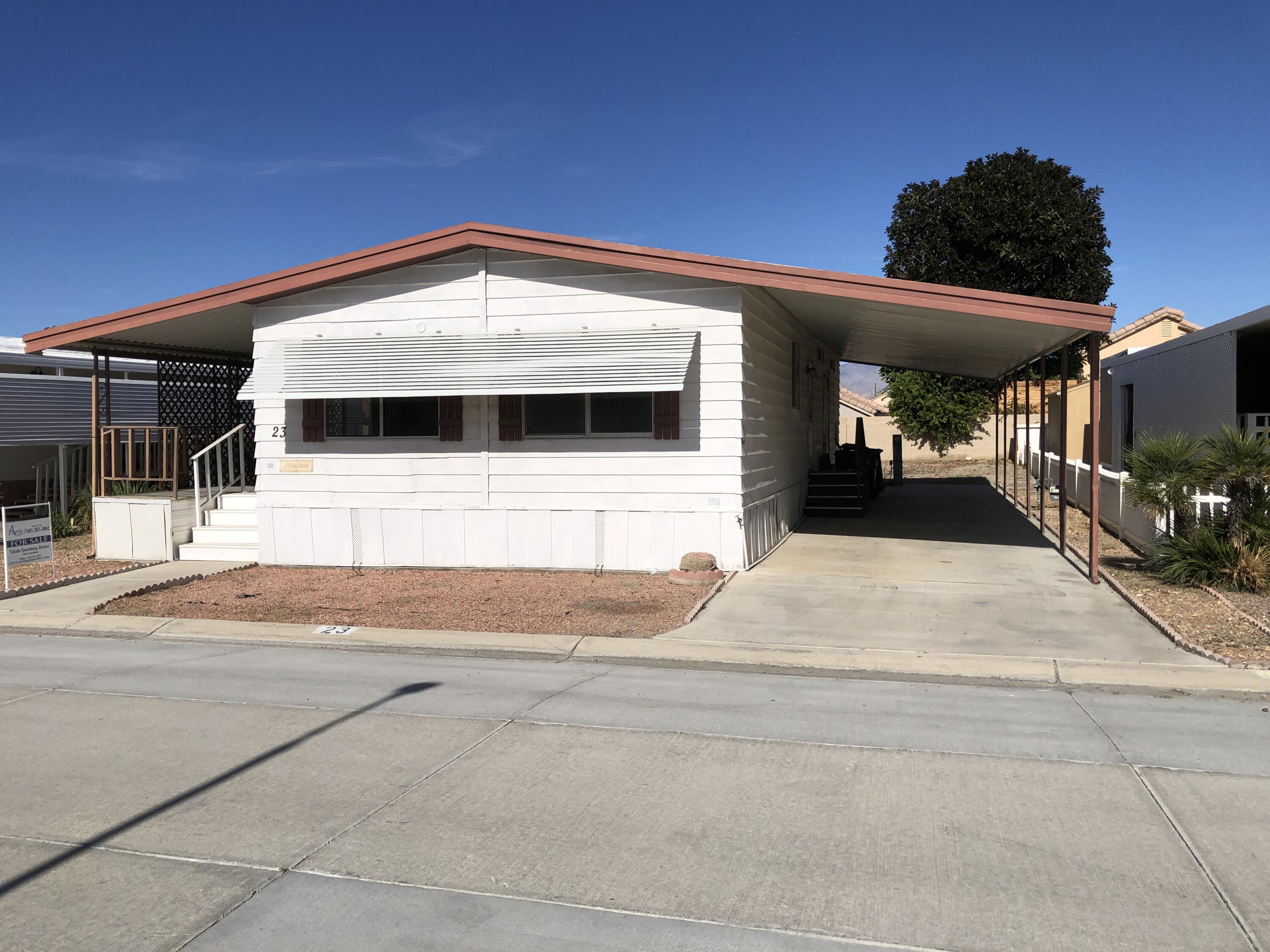 46618 Madison Street, Unit 23 Indio, CA 92201 - Photo 4 of 18 a view of the entrance of the house