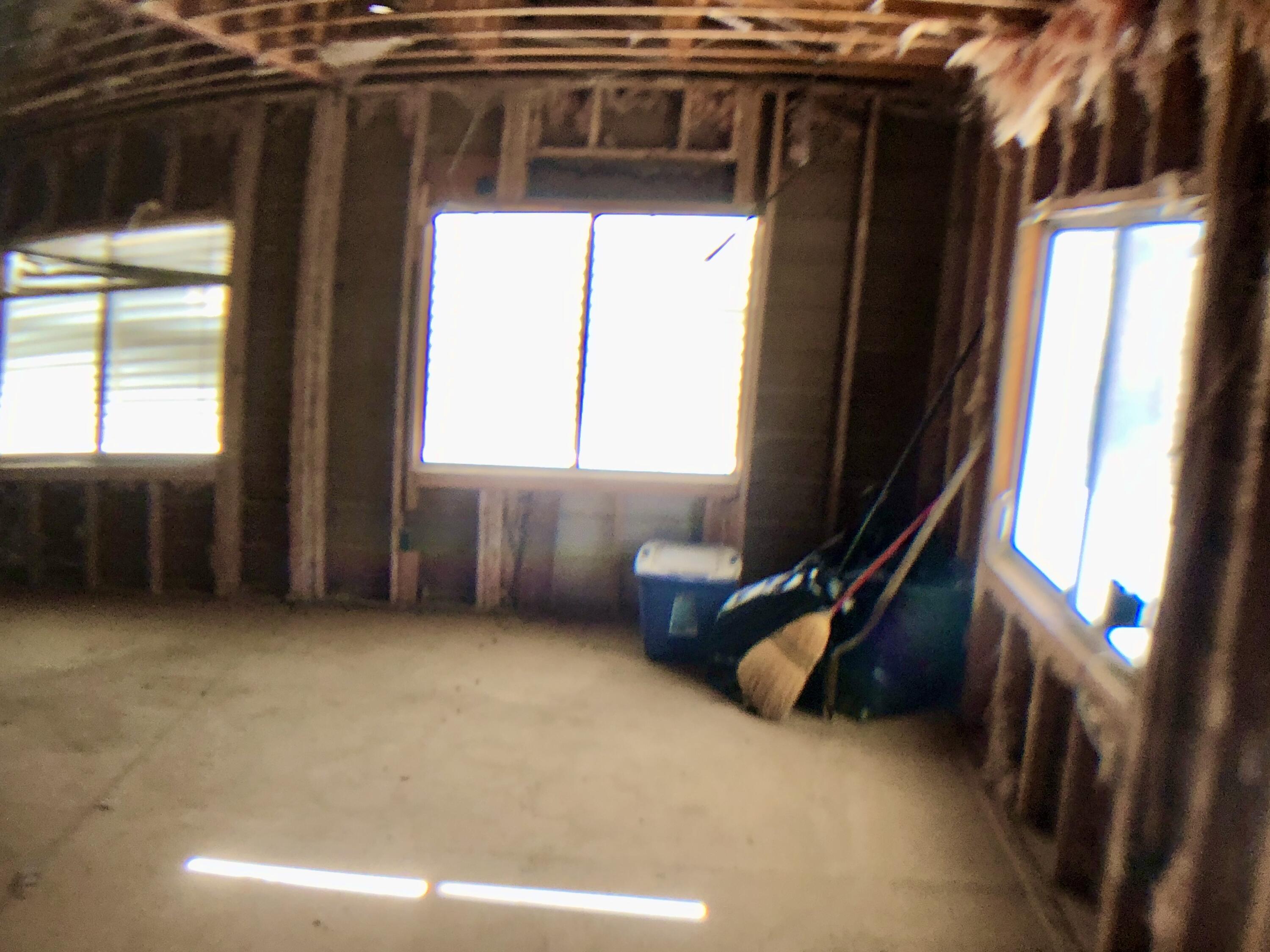 46618 Madison Street, Unit 23 Indio, CA 92201 - Photo 9 of 18 a view of an empty room with a window