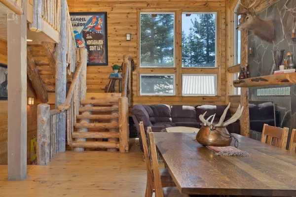 a view of a dining room with furniture window and outside view