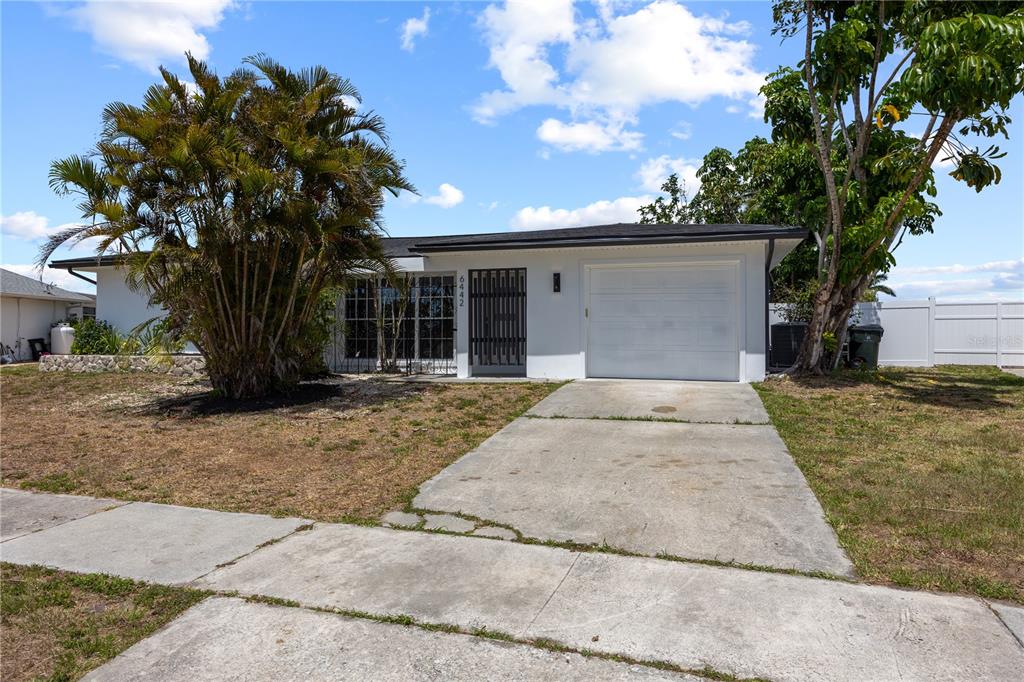 6442 Fabian Road North Port, FL 34287 - Photo 1 of 1 a view of a house with a tree