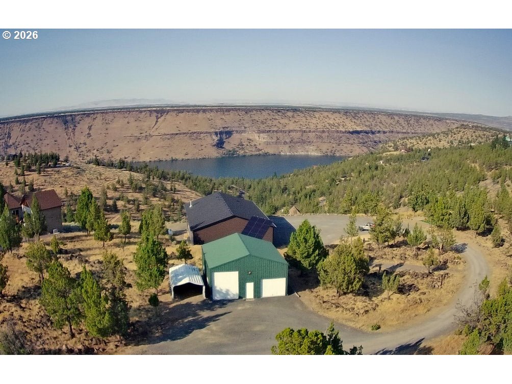 4463 Southwest Corral Drive Culver, OR 97734 - Photo 1 of 39 an aerial view of a house with a yard