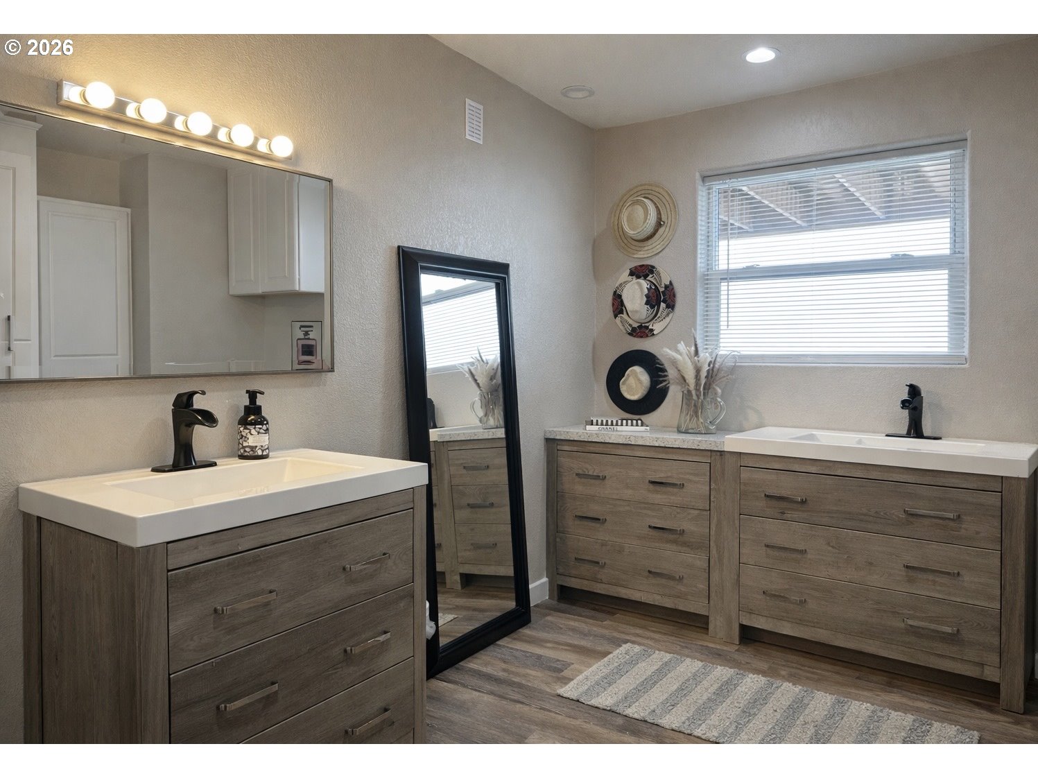 4463 Southwest Corral Drive Culver, OR 97734 - Photo 15 of 39 a view with double vanity sink a mirror a lamp and window
