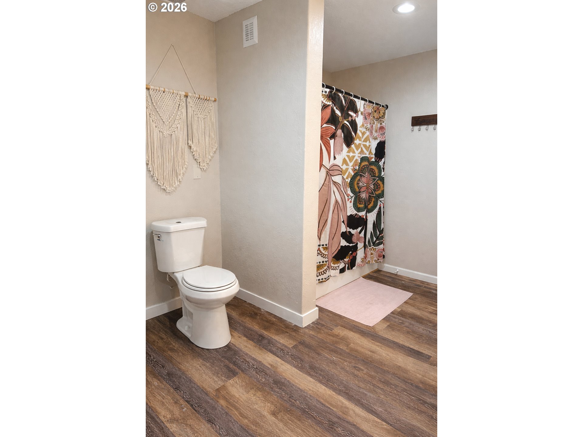 4463 Southwest Corral Drive Culver, OR 97734 - Photo 16 of 39 a bathroom with a toilet and a shower