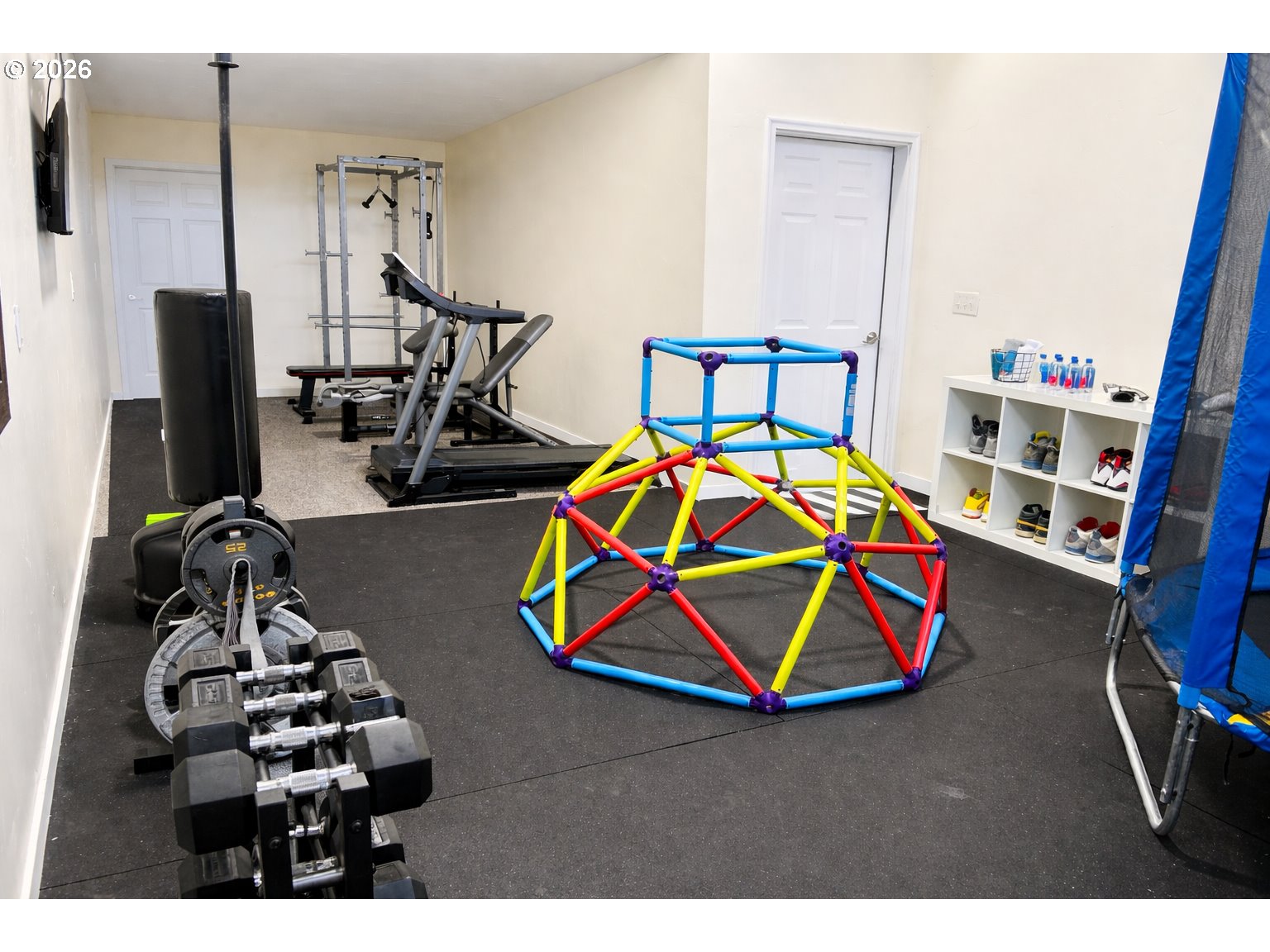 4463 Southwest Corral Drive Culver, OR 97734 - Photo 17 of 39 a room with gym equipment and air hockey table