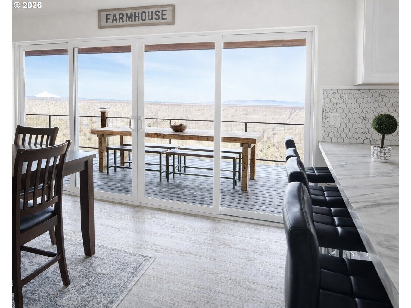 4463 Southwest Corral Drive Culver, OR 97734 - Photo 25 of 39 a view of a dining room with furniture window and wooden floor