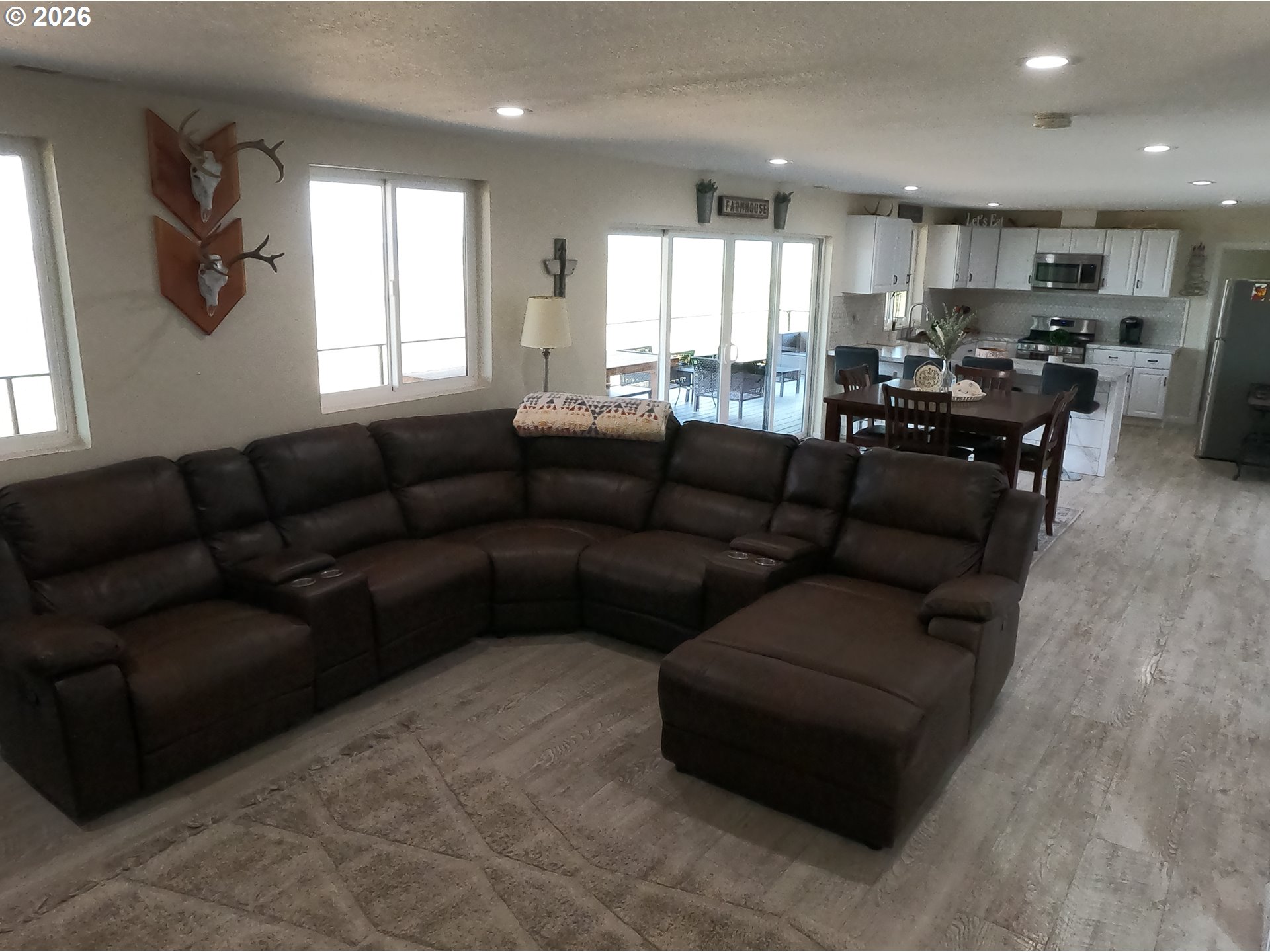4463 Southwest Corral Drive Culver, OR 97734 - Photo 26 of 39 a living room with furniture and windows
