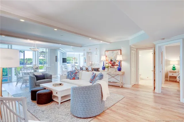 a kitchen with stainless steel appliances kitchen island granite countertop a sink and cabinets