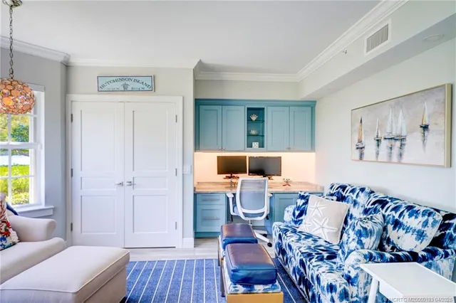 a bedroom with a bed and a table in it