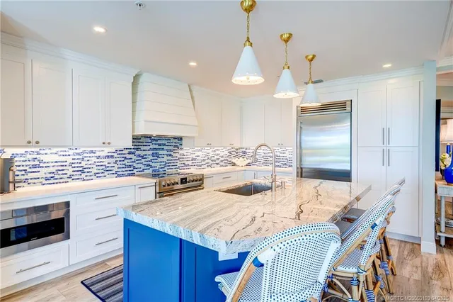 a bathroom with a sink a mirror and a toilet