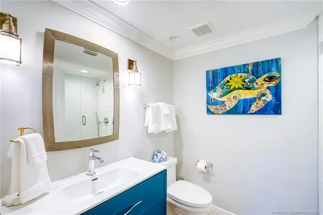 a bedroom with bed and a table