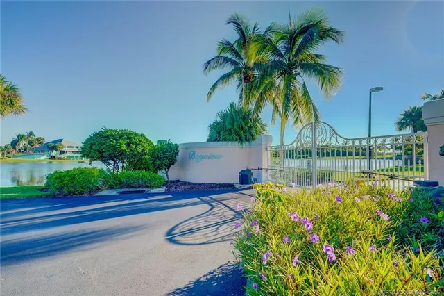 a view of a swimming pool and lounge chair