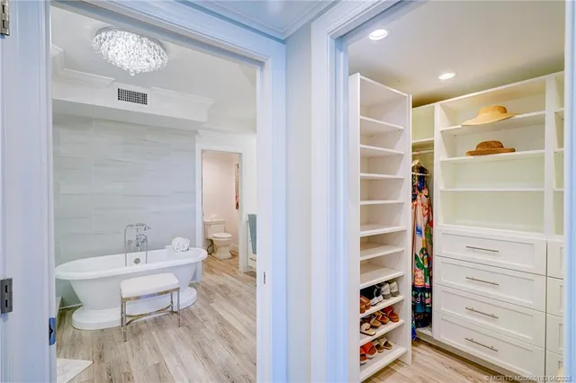 a view of a swimming pool with a lounge chairs