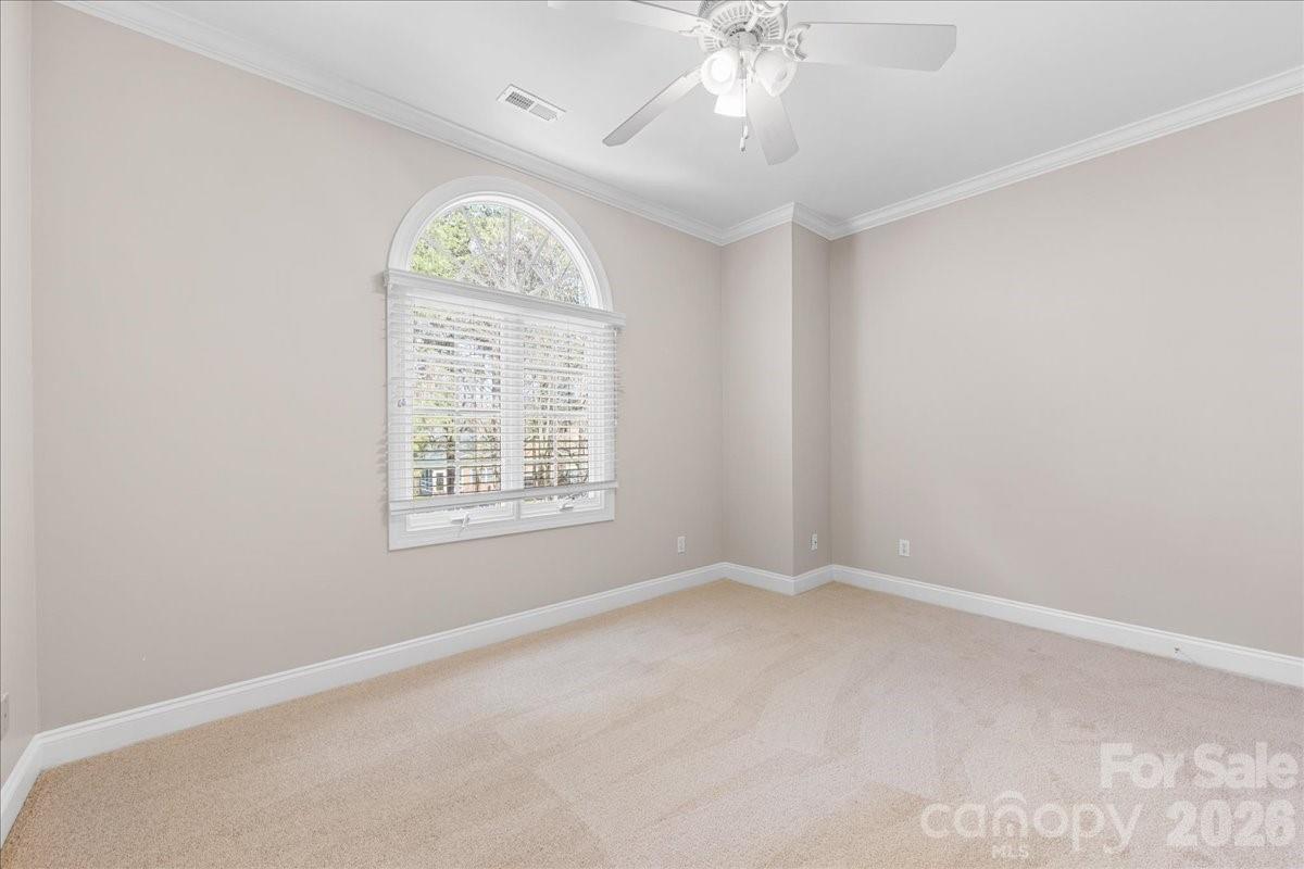 8380 Rocky River Road Harrisburg, NC 28075 - Photo 39 of 47 an empty room with a window