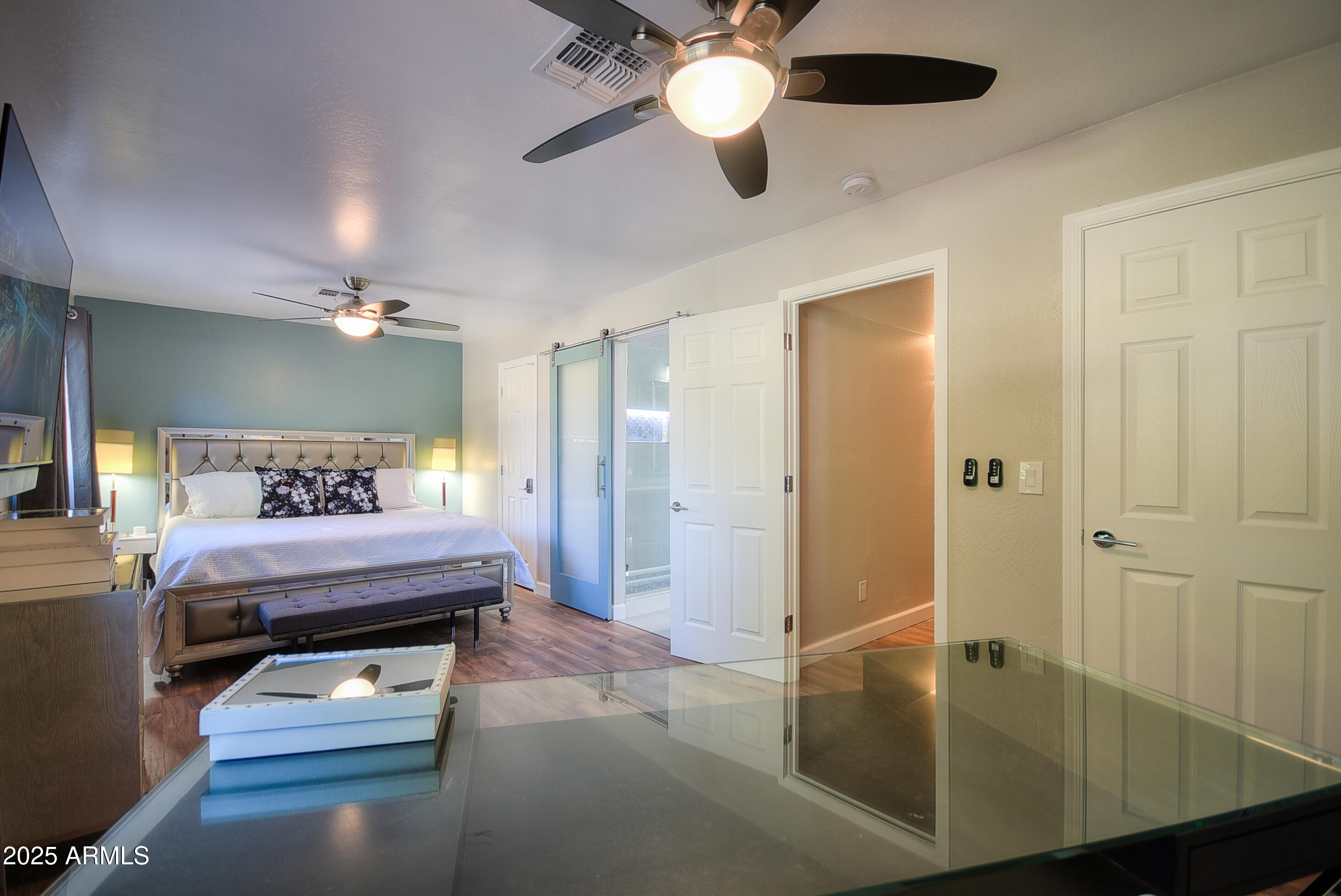 7603 East Montecito Avenue Scottsdale, AZ 85251 - Photo 13 of 21 a bathroom with a bathtub and a shower