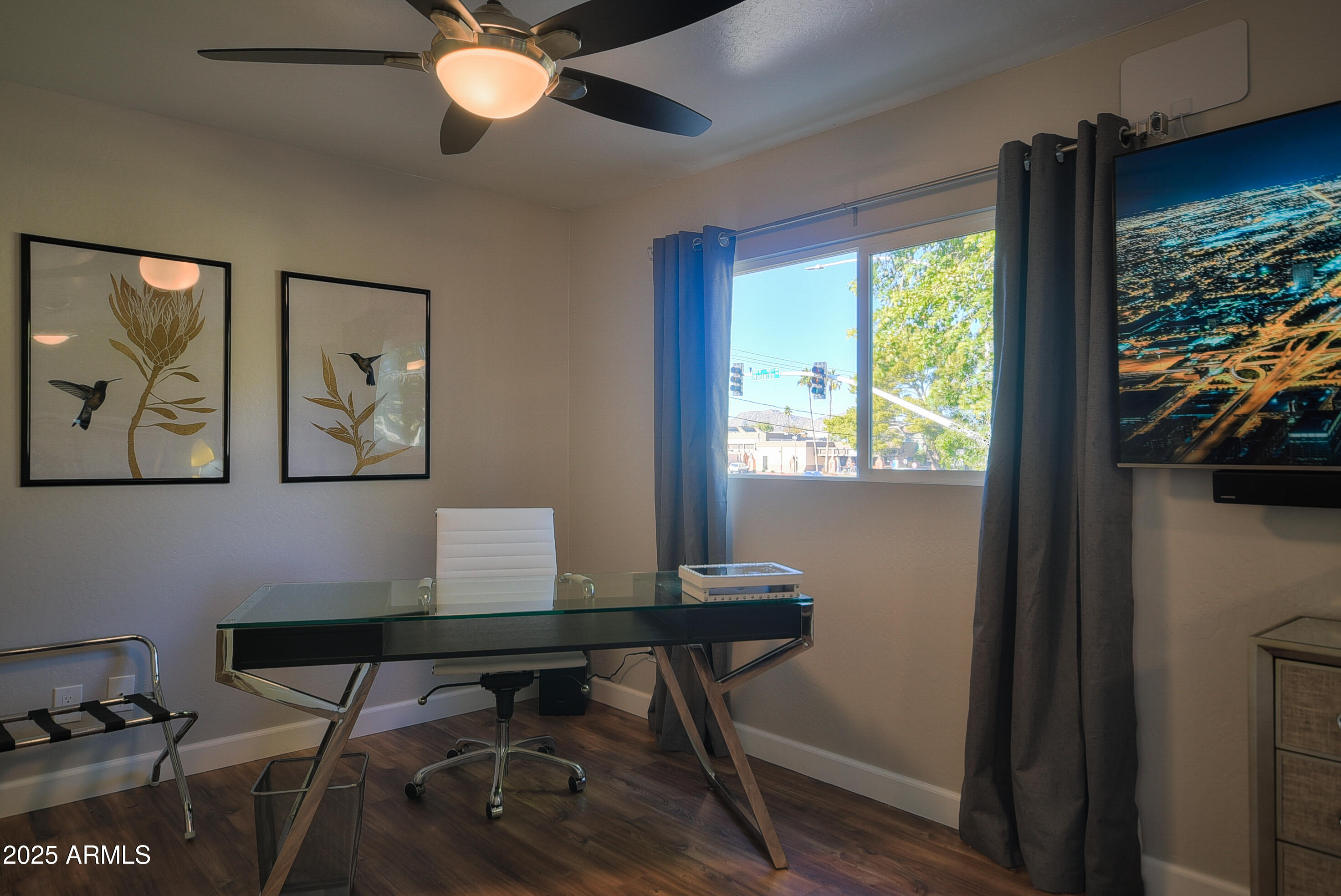 7603 East Montecito Avenue Scottsdale, AZ 85251 - Photo 15 of 21 a workspace with furniture and a window