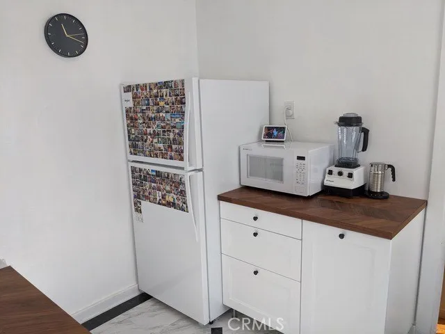 a room with a window and gym equipment