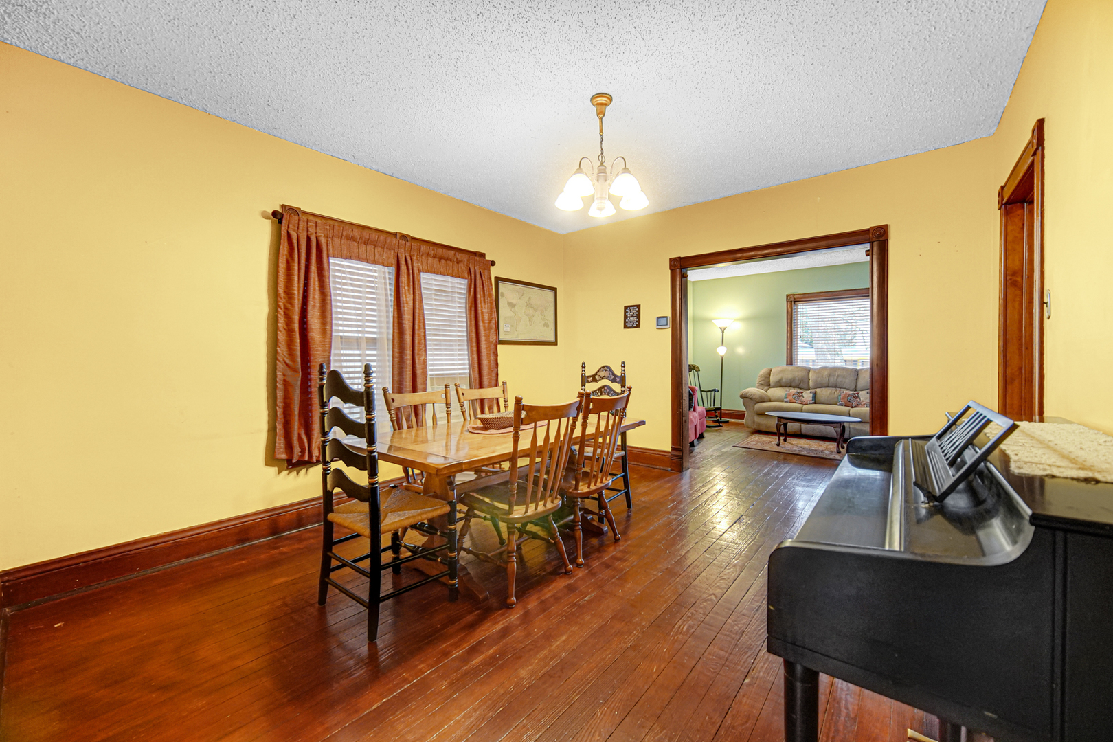 1112 South Jefferson Street Lockport, IL 60441 - Photo 11 of 21 a dining room with furniture window and wooden floor