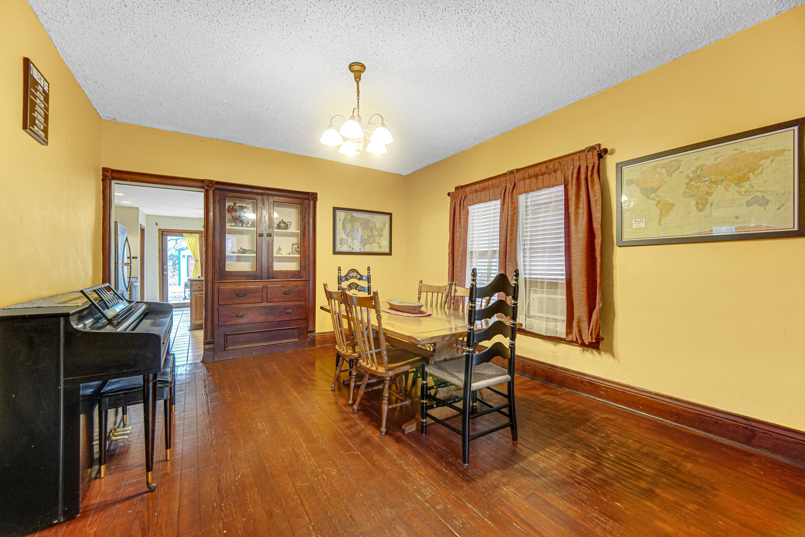 1112 South Jefferson Street Lockport, IL 60441 - Photo 10 of 21 a view of a dining room with furniture window and wooden floor