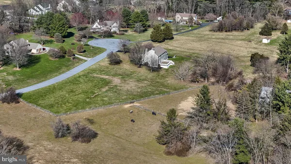 a view of a backyard of a house