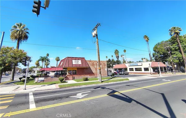 a childrens park with lots of swings and slides