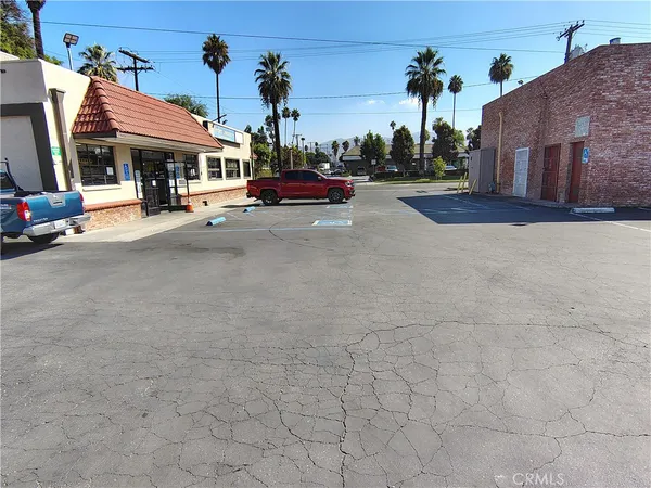 a view of a street with cars