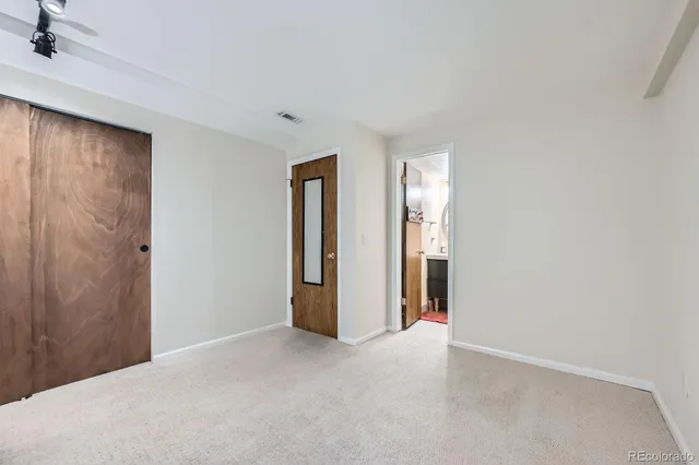 a view of a livingroom with a staircase