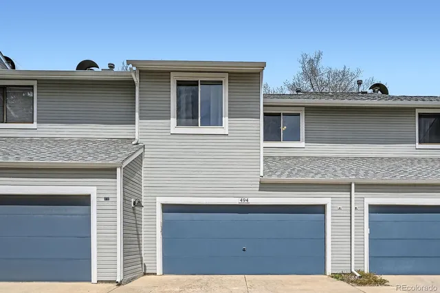 a view of a house with a window and table
