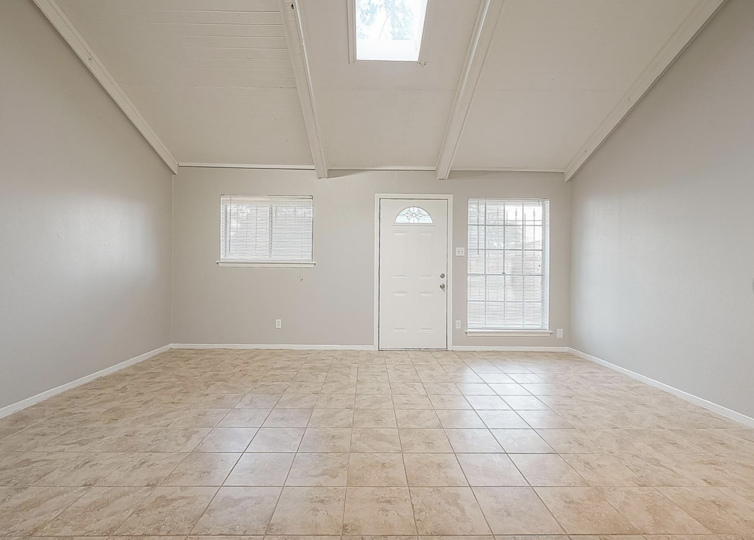 1108 West Tri Oaks Lane, Unit 150 Houston, TX 77043 - Photo 6 of 26 an empty room with windows and closet
