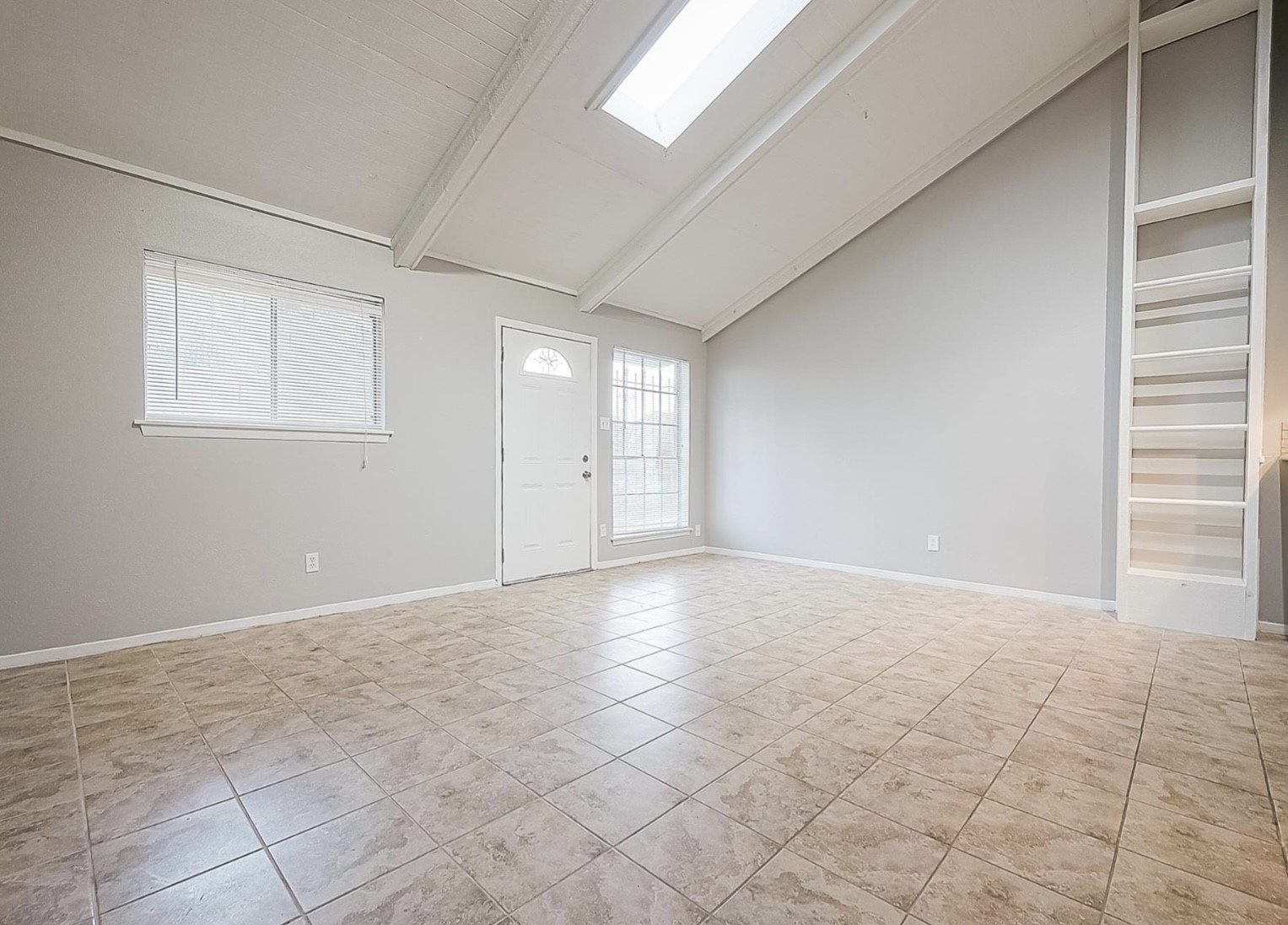 1108 West Tri Oaks Lane, Unit 150 Houston, TX 77043 - Photo 8 of 26 a view of an empty room with a window