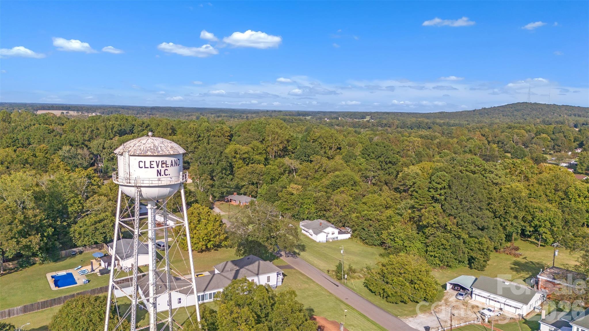 208 East Main Street Cleveland, NC 27013 - Photo 11 of 48 a view of a pathway with a lake in the background