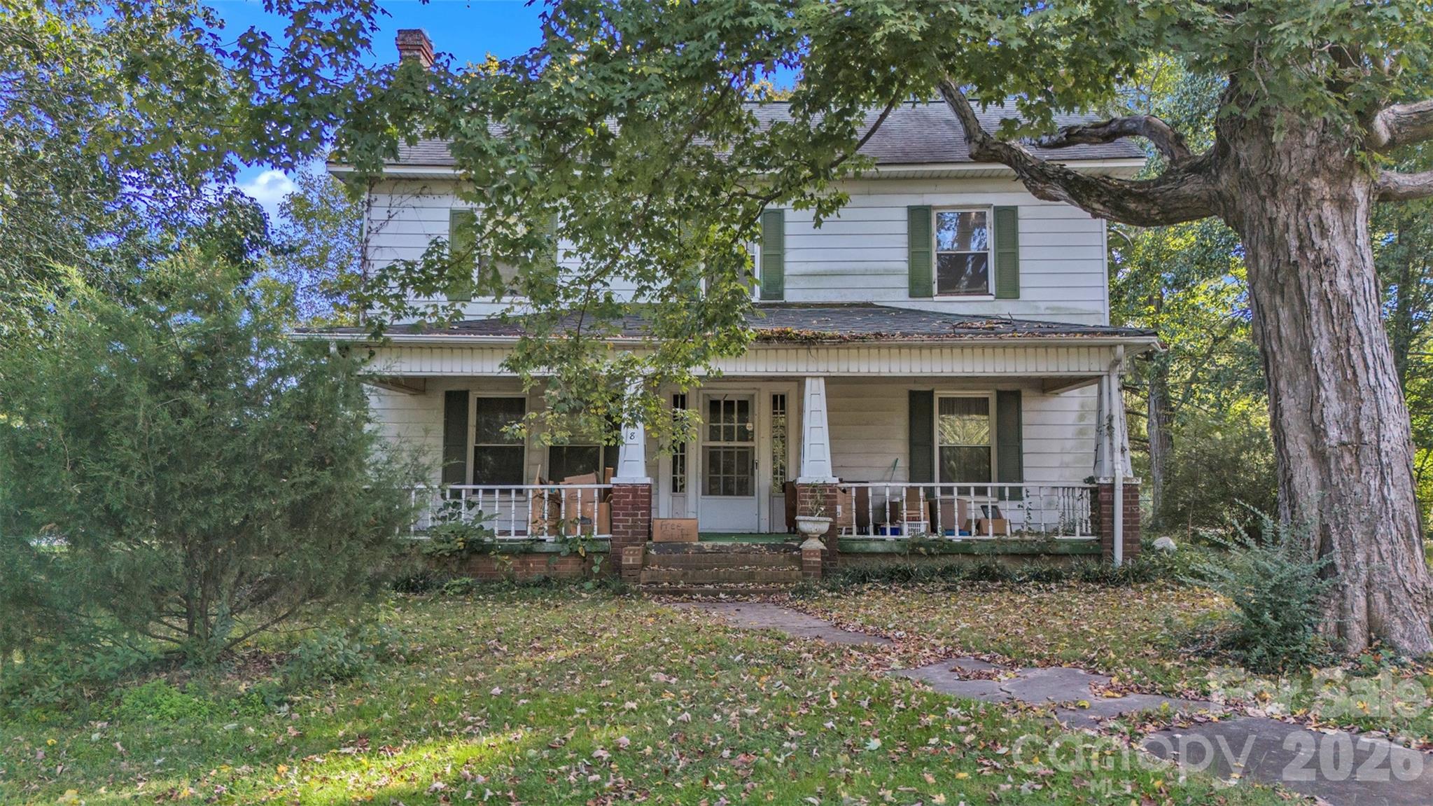 208 East Main Street Cleveland, NC 27013 - Photo 16 of 48 a front view of a house with garden